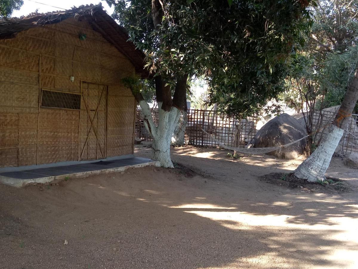 Sunrise Guest House & Restaurant Hampi Bagian luar foto